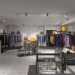 Suits and shoes in clothing store for men